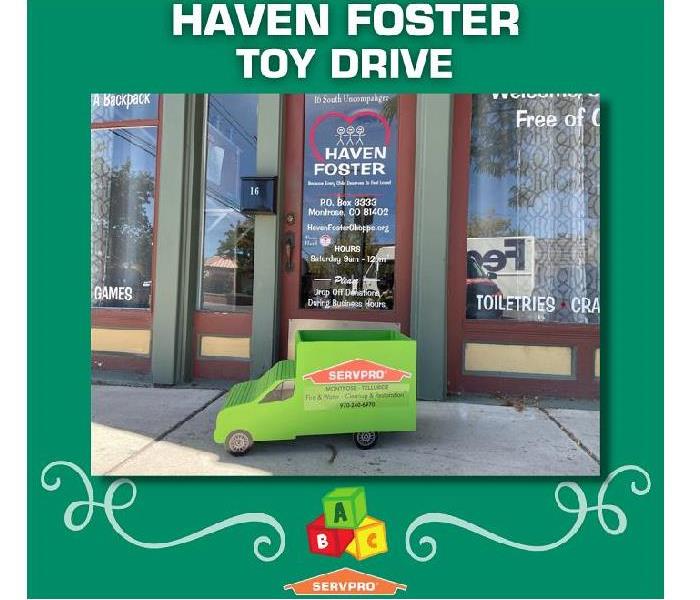 cardboard SERVPRO truck in front of Haven Foster storefronr