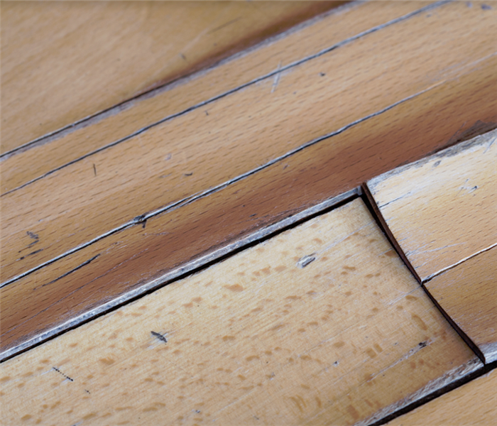 bowed wooden flooring